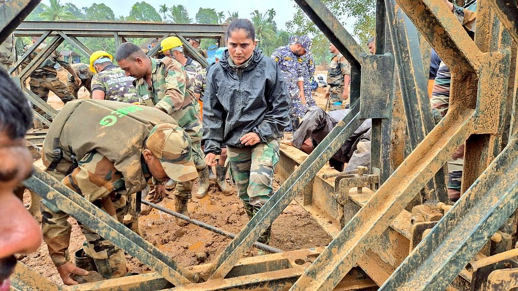 Maj Seeta Shelke along with her team of Engineers Regiment of Indian Army in the process of building bridge for relief ops  - X/@PRODefNgp

